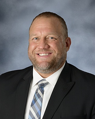 Dr. Kevin Carroll, Principal